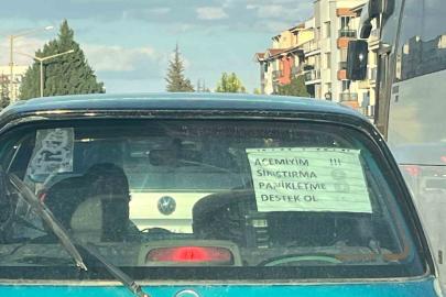 Acemi sürücünün arabasına astığı not dikkat çekiyor