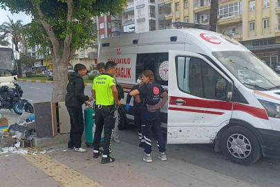 Devrilen motosikletle beraber metrelerce sürüklendiler