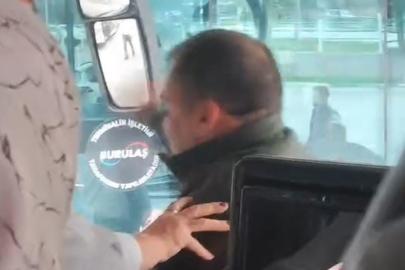 Otobüste yumruklu kavga kamerada