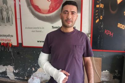 Ayırmaya çalıştığı kavga nedeniyle 3 yaşındaki oğlunun yanında saldırıya uğradı