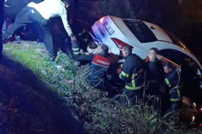 Şarampole uçan otomobilden çıkmak istemedi, ekiplere zor anlar yaşattı