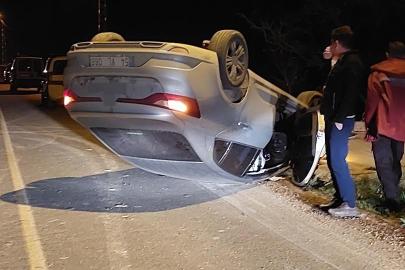 Yola dökülen kuma çarpan otomobil takla attı