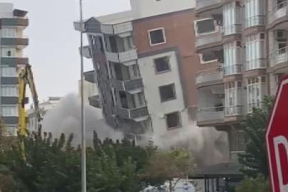 Ağır hasarlı bina yıkım sırasında korna sesiyle yerle bir oldu, facianın eşiğinden dönüldü