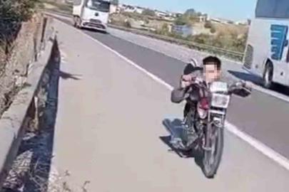 Otobanda motosikletin üzerine yatarak şov yapan sürücüye 63 bin TL ceza