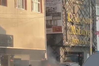 Yeni aldığı otomobilinden alevler yükseldi, yangını söndürdü