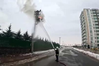 Elektrik direğindeki yangına müdahale, itfaiye erinin gözünden kayda alındı