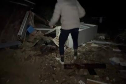 Hortumun savurduğu konteynerdeki yaralı adamın bulunduğu anların görüntüsü çıktı