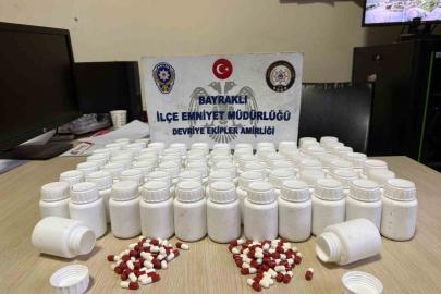 İzmir’de mezarlıkta poşet içerisinden binlerce uyuşturucu hap çıktı