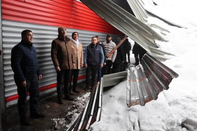 Mehmet Kuş, karda işyerleri zarar gören esnafla buluştu