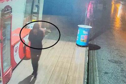 Yüzünü eliyle kapatarak büfeden alkol çalan hırsız yakayı ele verdi