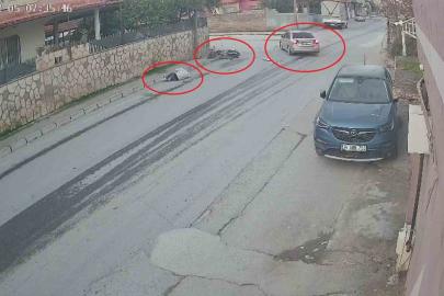 Otomobille çarpışan motosiklet sürücüsünün metrelerce havaya savrulduğu anlar kamerada