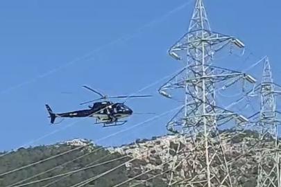 Bodrum’da yüksek gerilim hatları helikopterle temizlendi