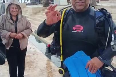 Denize düşen evlilik yüzüğünü dalgıçlar çıkardı