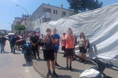 Turistler pazar alışverişini bırakıp yangın görüntüleme yarışına girdi