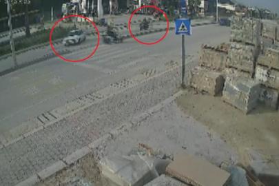 Yaya geçidini kullanmaya çalışan otomobille çarpışan motosikletli metrelerce havaya uçtu