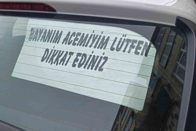 Acemi sürücünün arka cam yazısı dikkat çekti