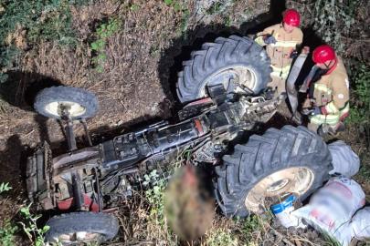 Devrilen traktörün altında kalan sürücü hayatını kaybetti