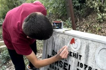 Feke’de öğrencilerden şehit kabirlerine vefa
