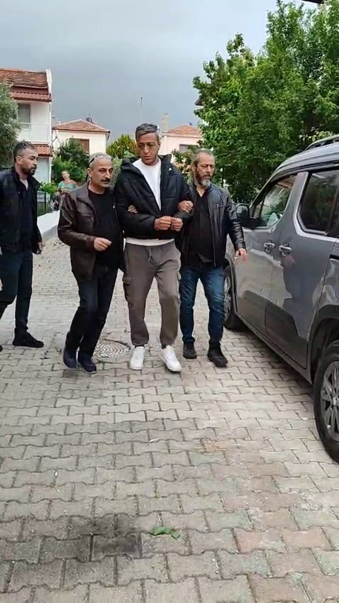 37 yıl 4 ay hapis cezasıyla aranan şüpheli, kız arkadaşıyla tatilde yakalandı